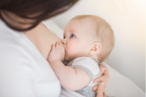 mother-breastfeeding-hugging-baby-young-mom